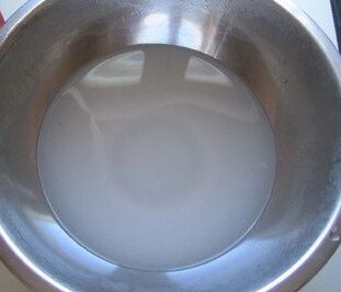 Soda is separated in a pot of water